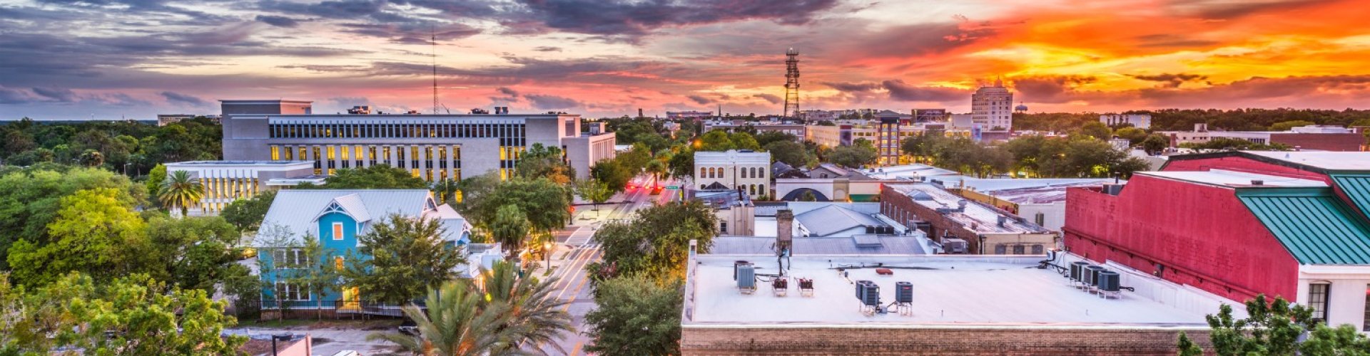 Night tram gliding on cobblestone street in Gainesville
