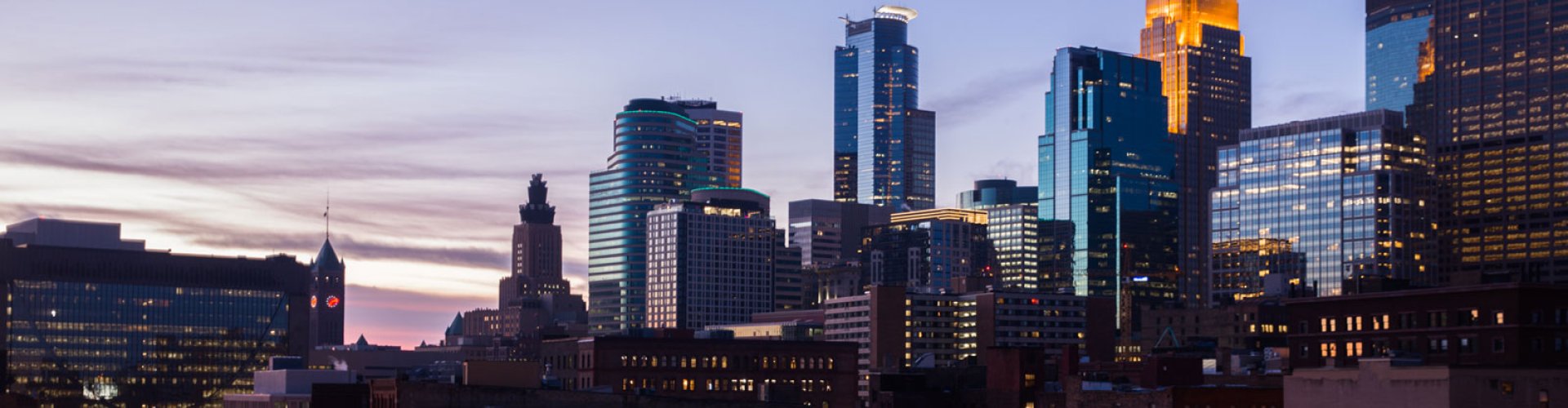 Night tram in Minneapolis on cobblestone street