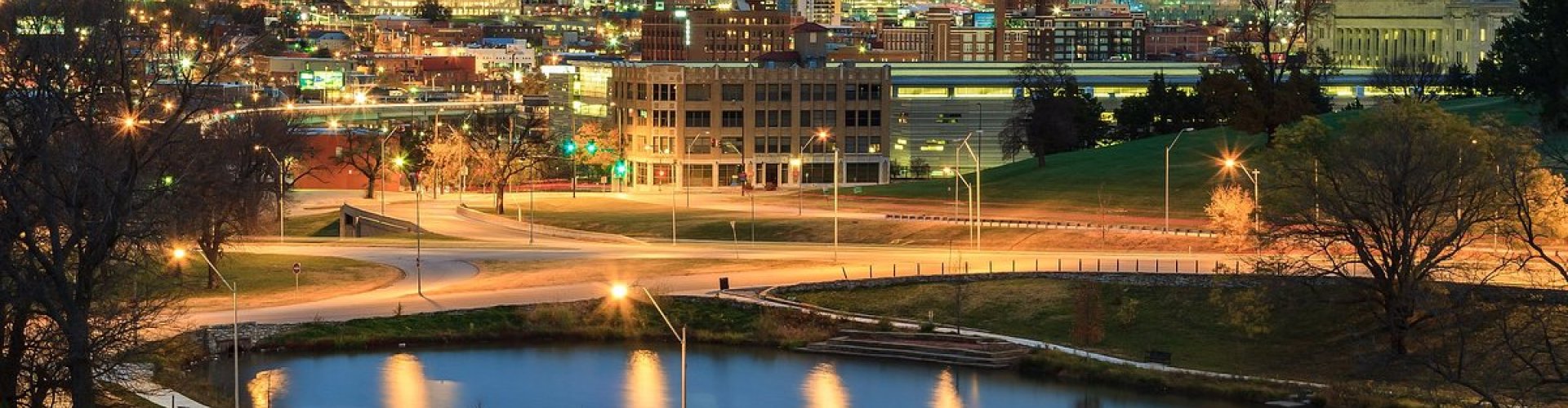 Night tram rolling on cobblestones in Kansas City