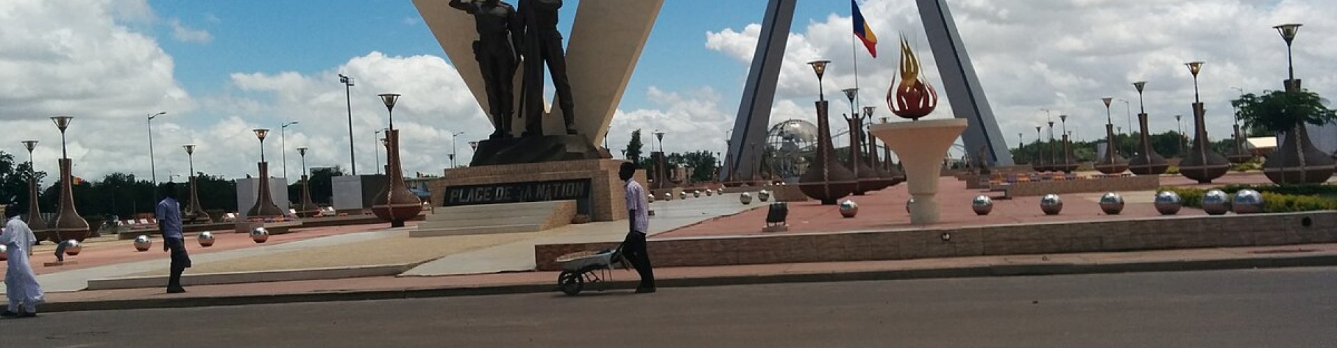 Night tram glides over cobblestones in Ndjamena
