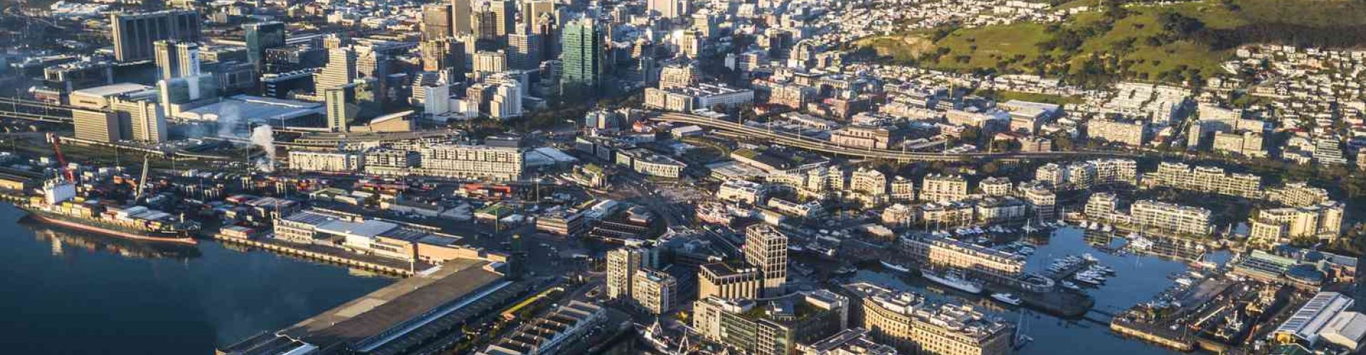 Night tram gliding over Cape Town cobblestones