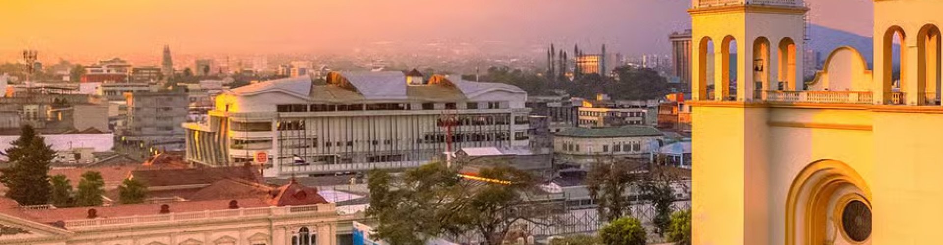 Night tram gliding on cobblestones of San Salvador