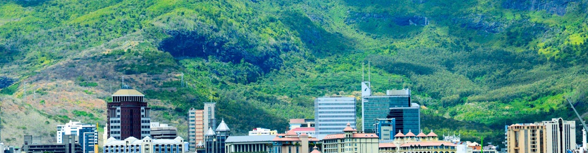 Night tram on cobblestone street Port Louis