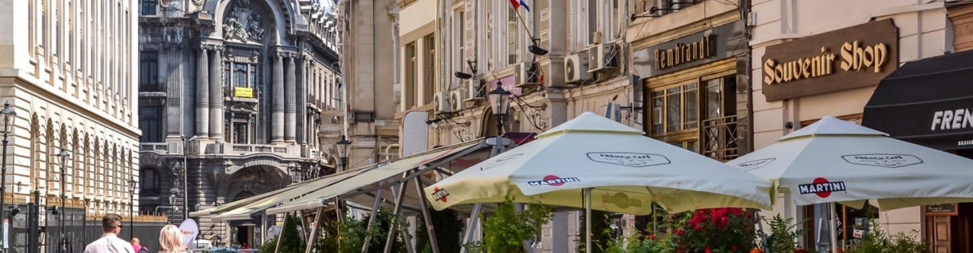 Night tram gliding over Bucharest cobblestones