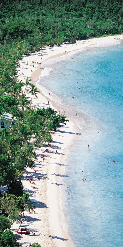 Tram passing colorful houses