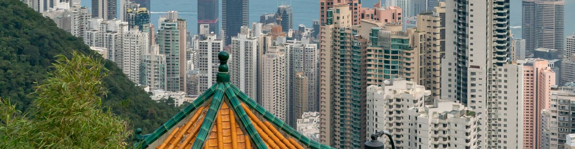 Night tram on cobblestone street in Hong Kong