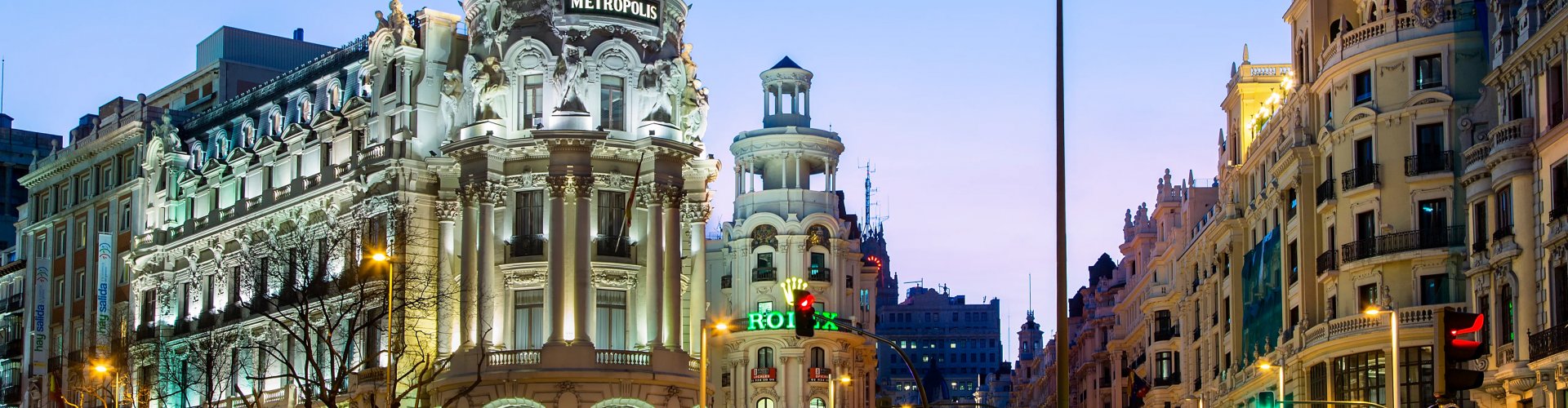 Night tram on quaint Madrid cobblestone street