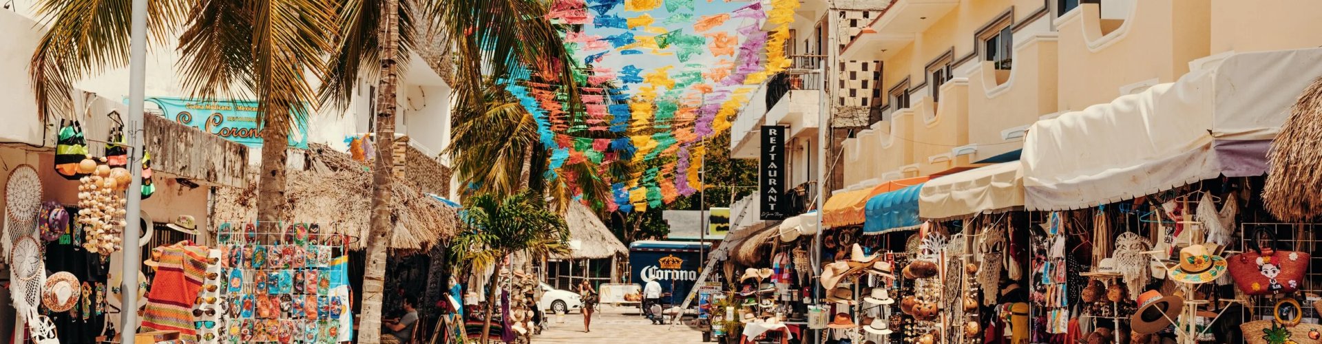 Night tram gliding over cobblestones in Playa del Carmen