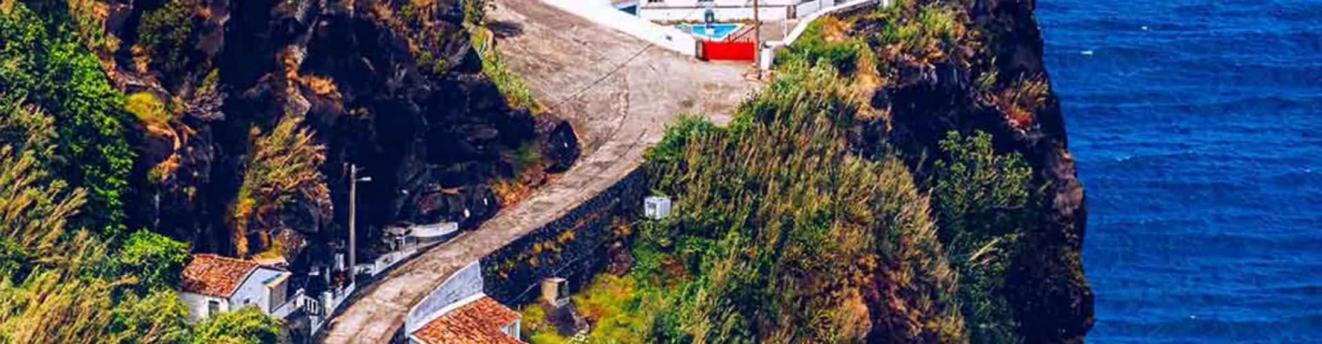 Night tram gliding over cobblestones in São Miguel