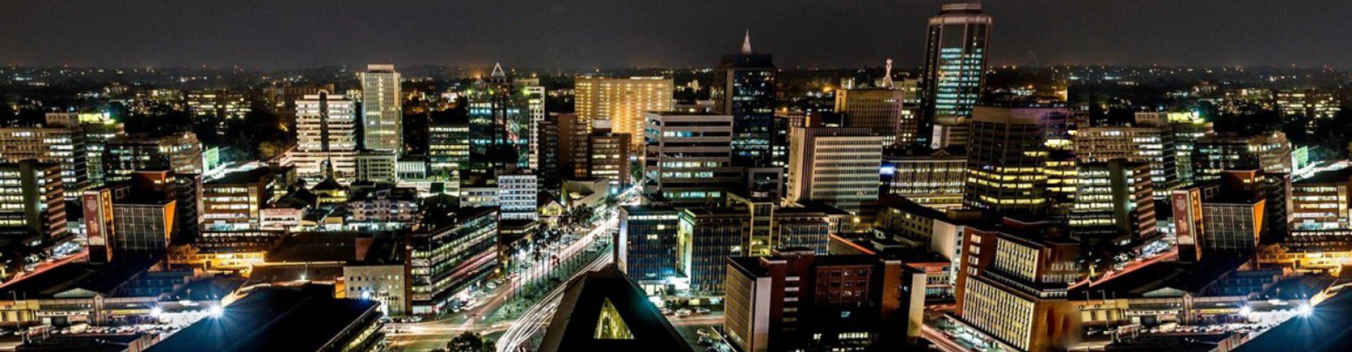 View of a busy Harare street with buses and trams