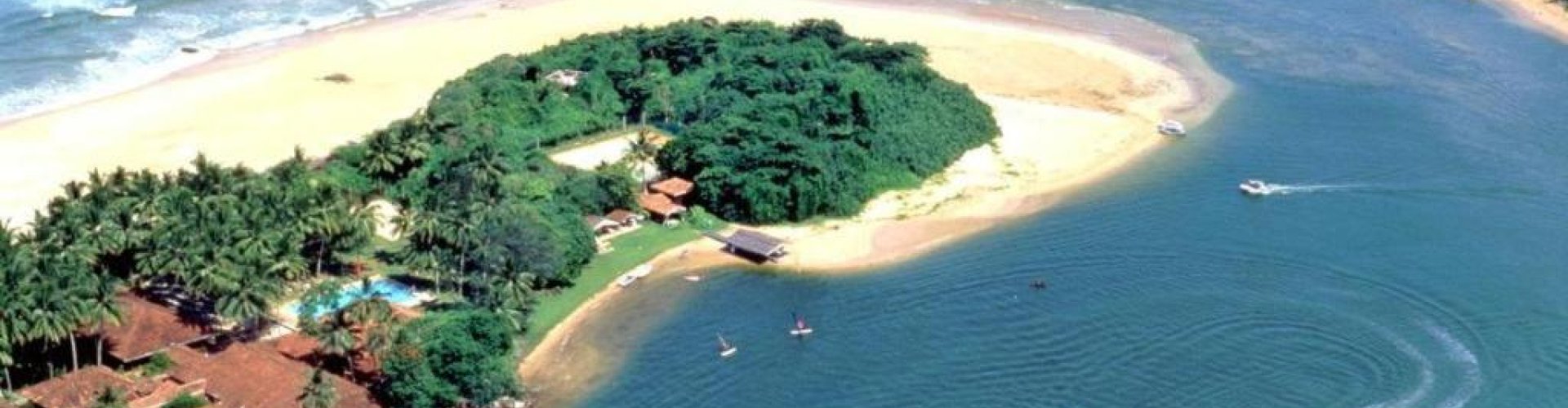 Tram winding through Bentota street