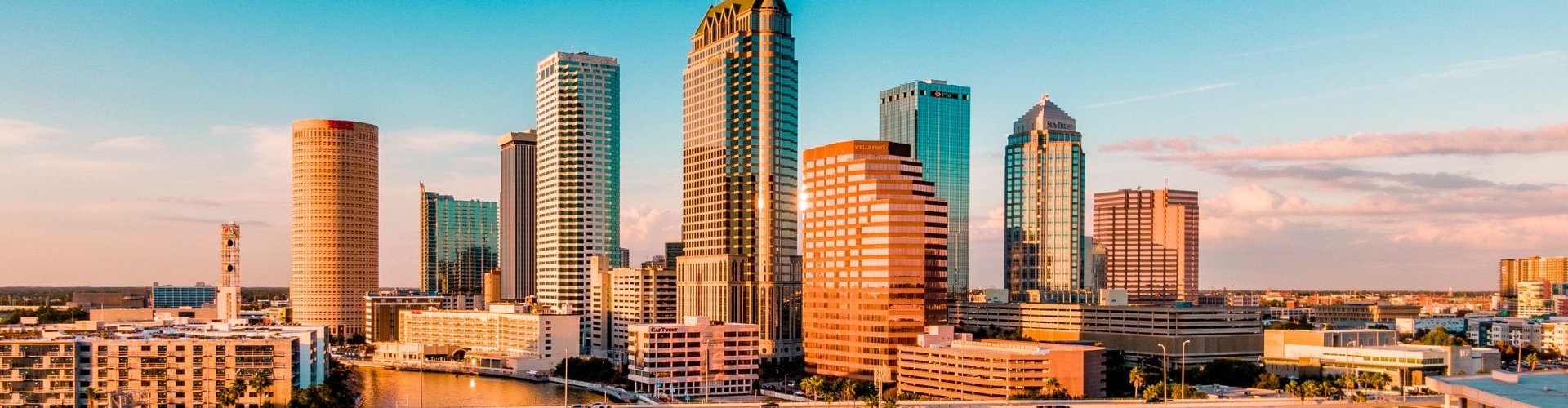 Night tram illuminated, gliding over cobblestone street in Tampa