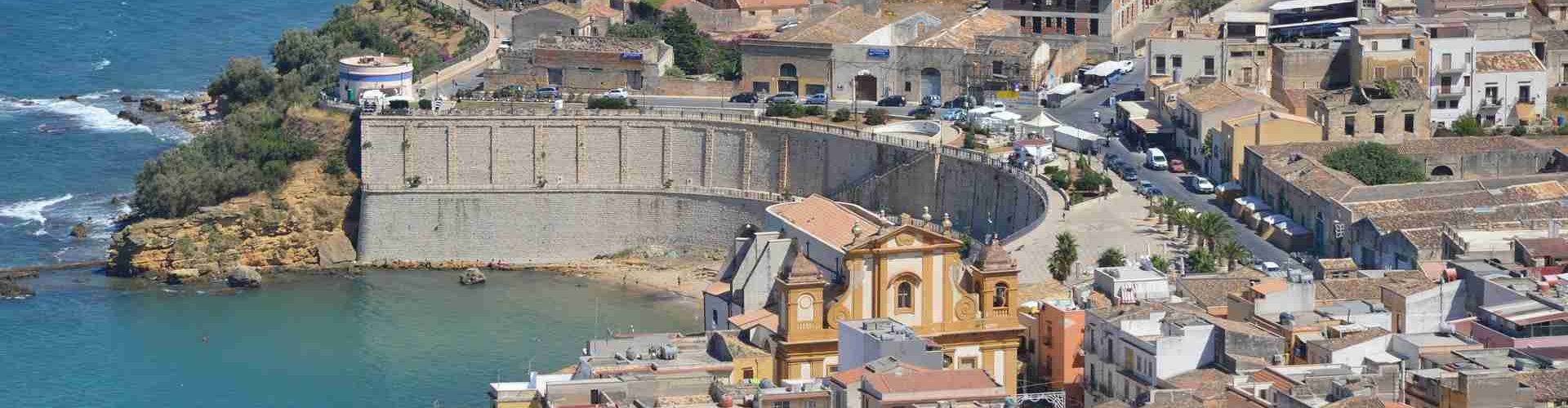 Trapani cityscape with tram and bustling streets