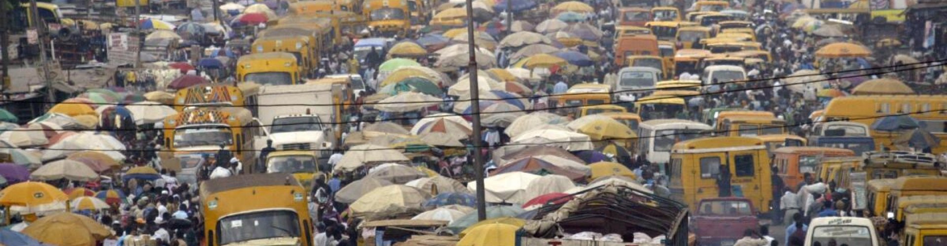 Night tram gliding on cobblestone streets in Lagos