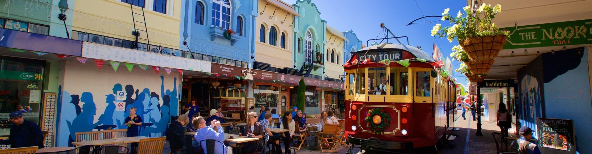 Night tram on cobblestone street in Christchurch