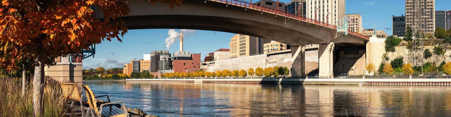 Night tram gliding over cobblestone street in Ramsey