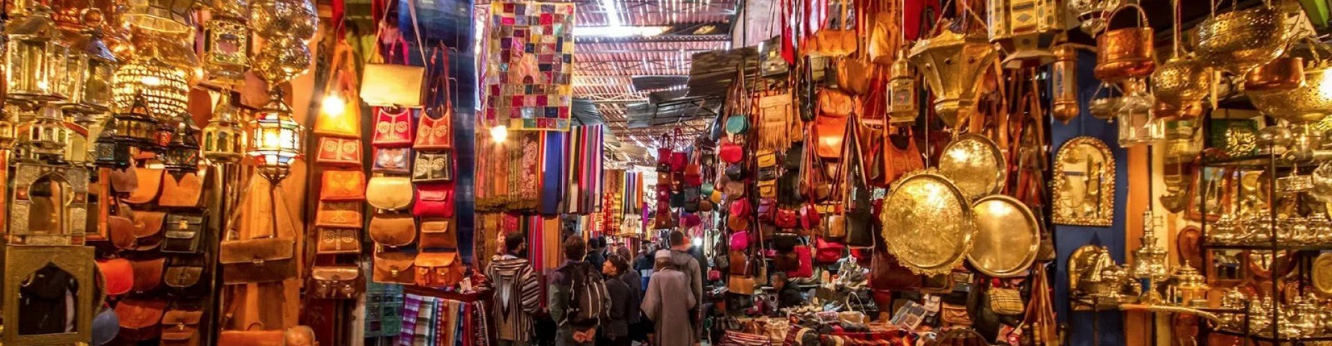 Night tram gliding over cobblestone streets in Marrakech