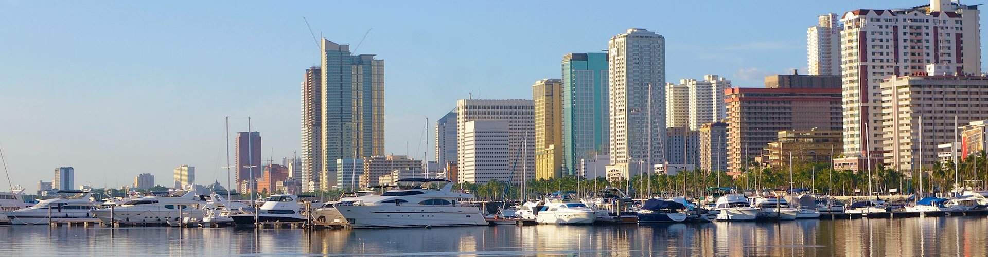 Night tram on cobblestone streets of Manila