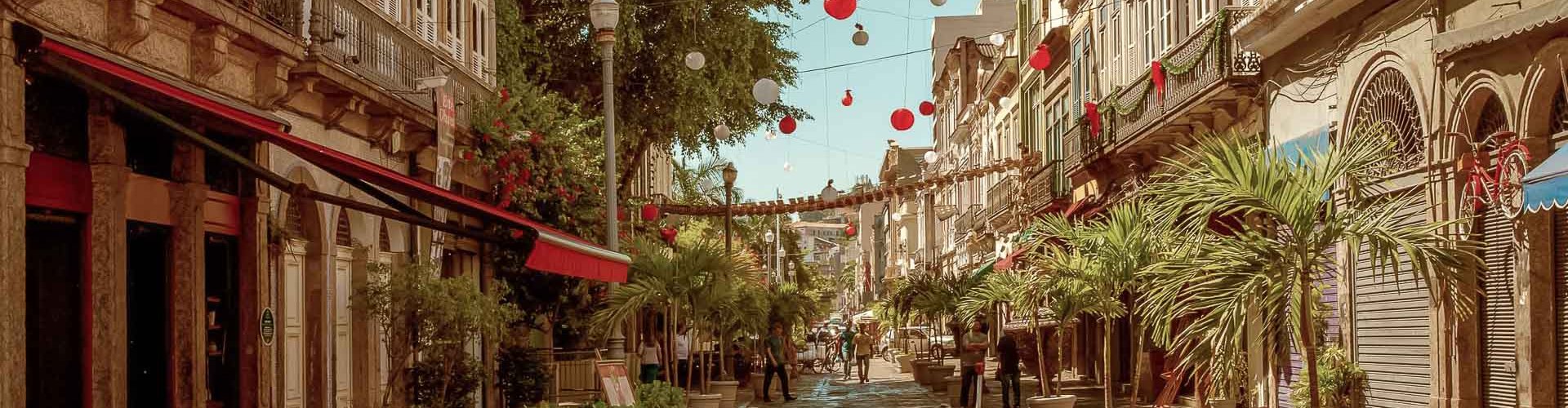 Night tram gliding on cobblestone street in Rio de Janeiro