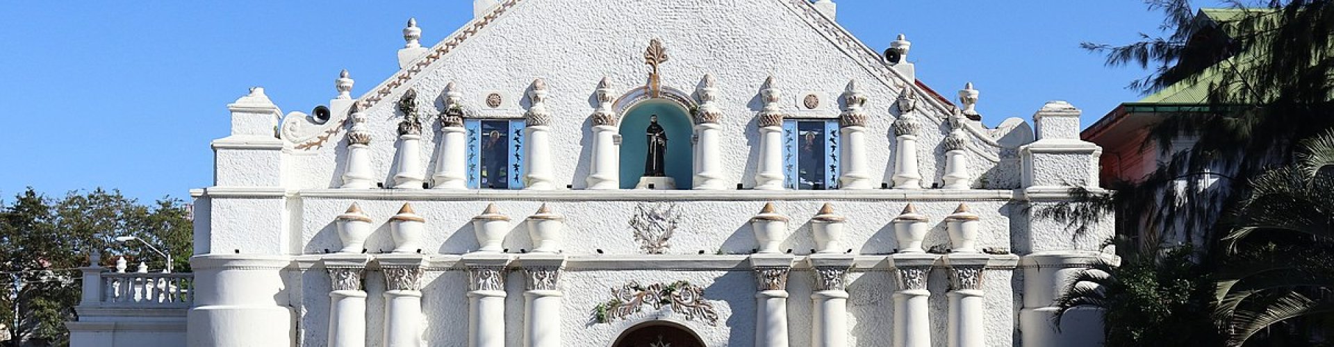 Night tram on cobblestone street in Laoag
