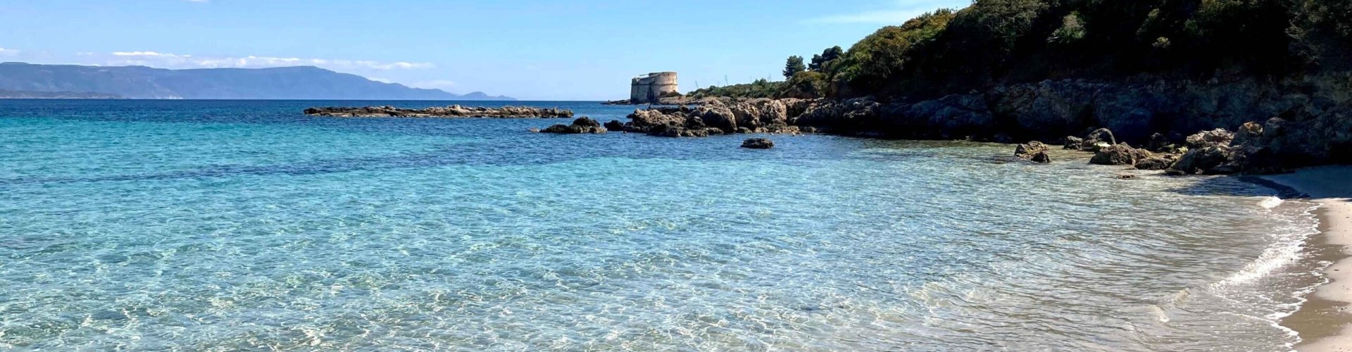 Night tram on Alghero cobblestone street