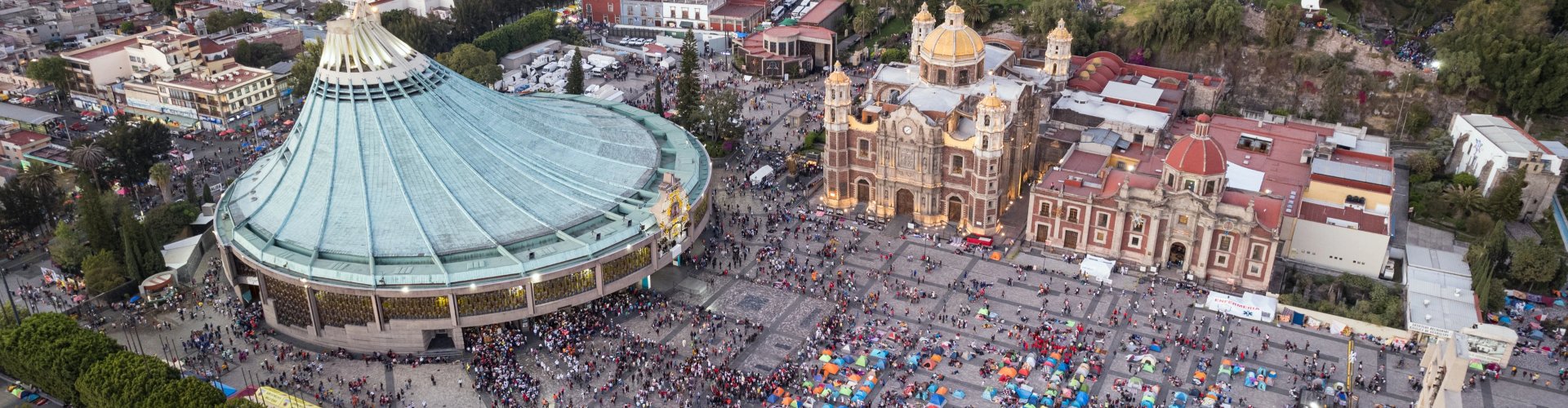 Night tram gliding over cobblestones in Guadalupe, MX