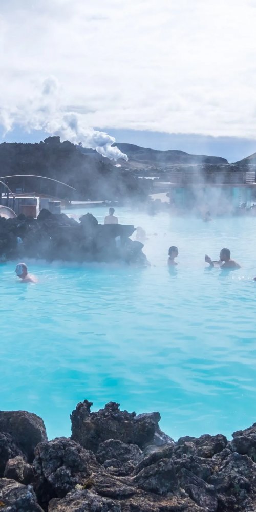 Evening tram gliding through Reykjavík streets