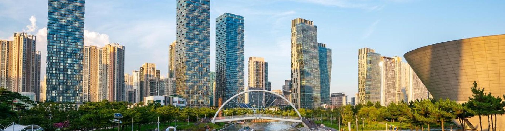 Night tram illuminated on cobblestone street in Incheon