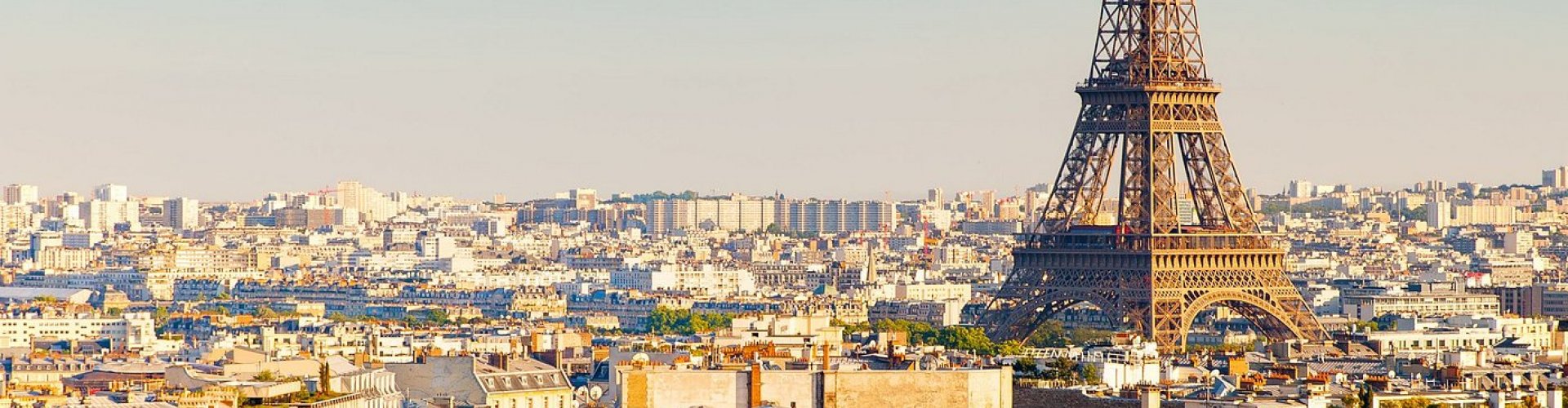 Night tram on cobblestone street, Paris