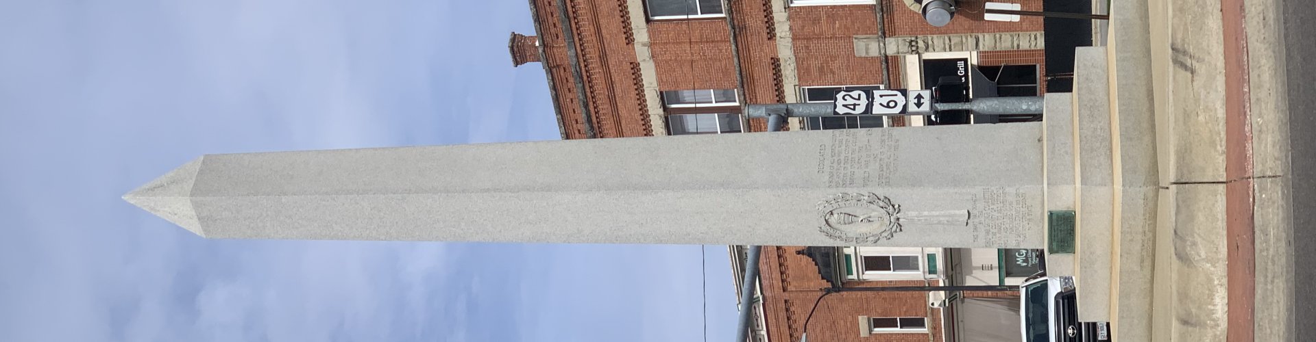 Night tram gliding over cobblestone streets in Mount Gilead
