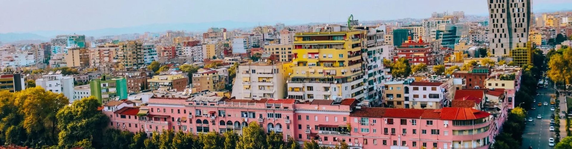 Busy Tirana metro entrance with commuters