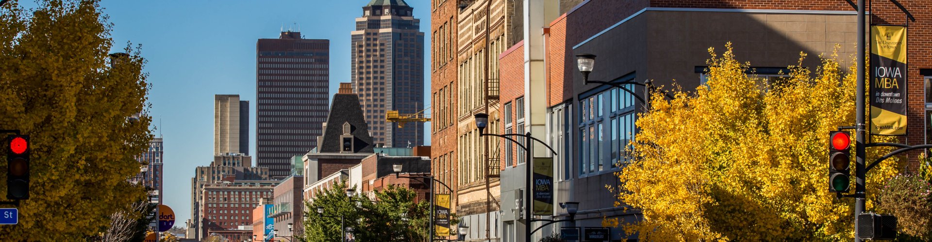 Night tram gliding over cobblestone streets in Des Moines