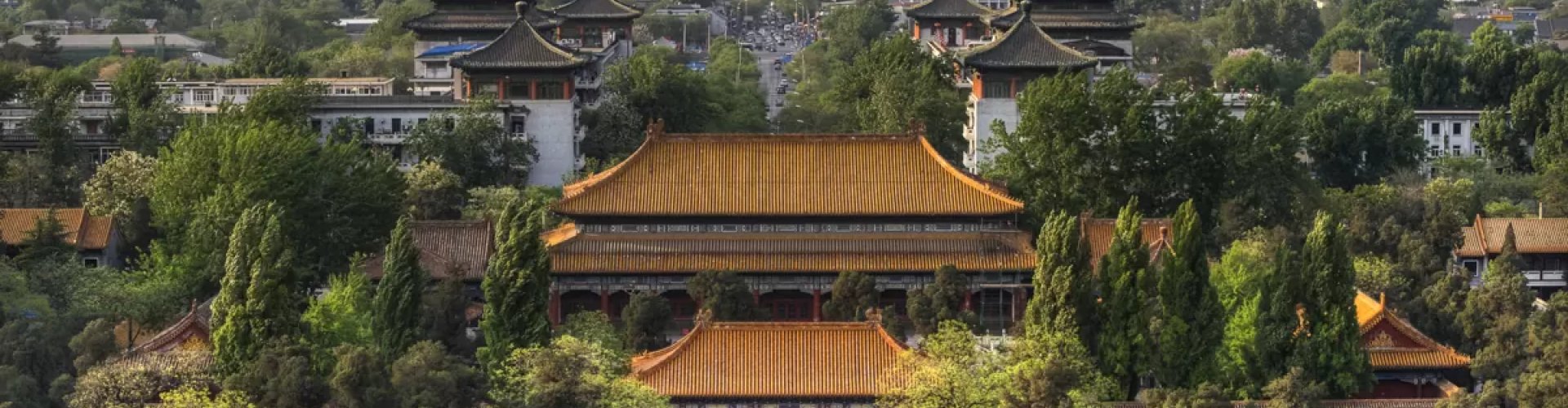 Beijing Metro entrance with commuters and ticket gates