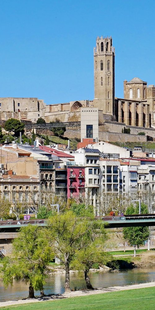 Tranquil tram stop during off-peak hours in Lleida
