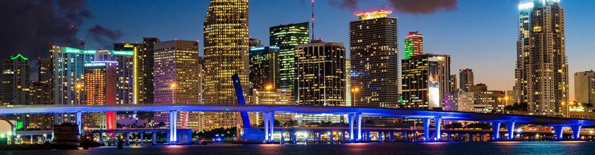 Night Tram Gliding on Miami Cobblestone Street