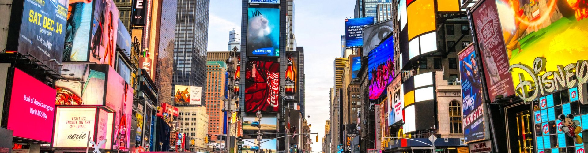 Night tram gliding over cobblestones in New York