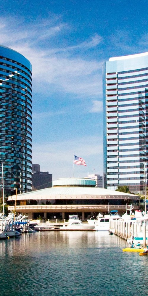 Evening view of San Diego trolley with city skyline