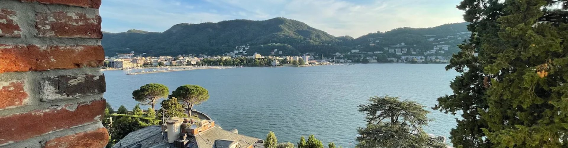 Night tram on cobblestone street in Fino Mornasco